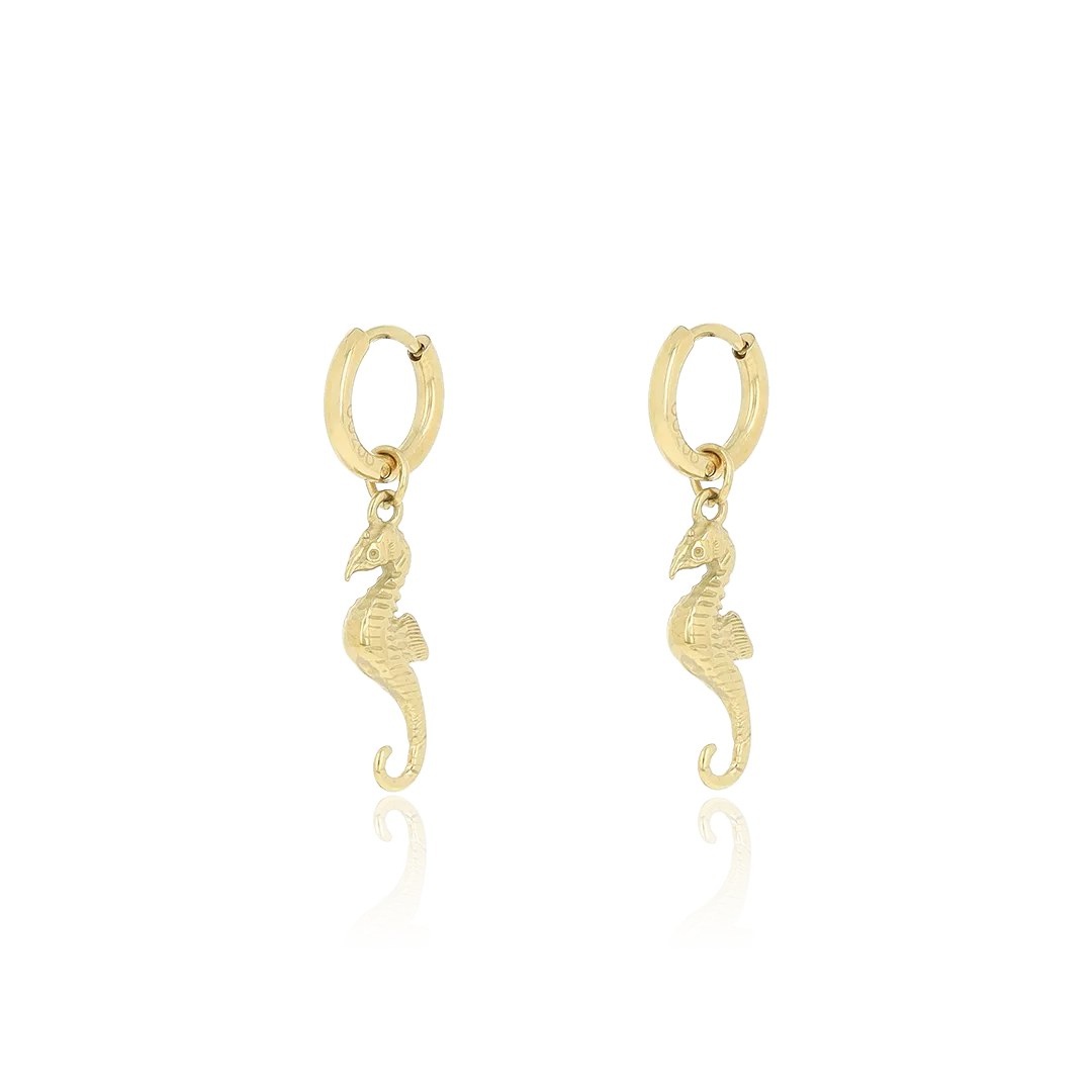 Gold coloured hoop earrings with sea horse charm