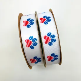 Patriotic paw print ribbon in red white and blue printed on 7/8"  white grosgrain and Satin