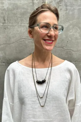Shape Shifter Necklace - Brass and Black Tibetan Glass