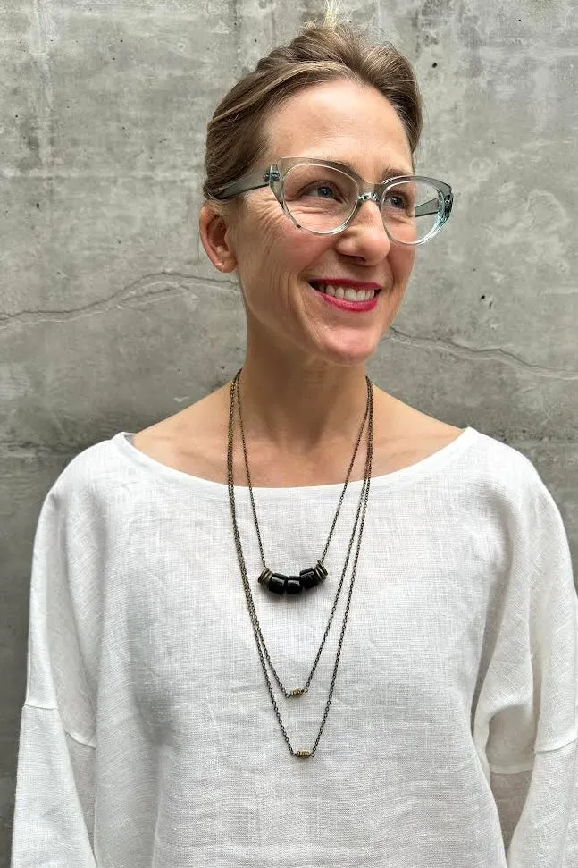 Shape Shifter Necklace - Brass and Black Tibetan Glass