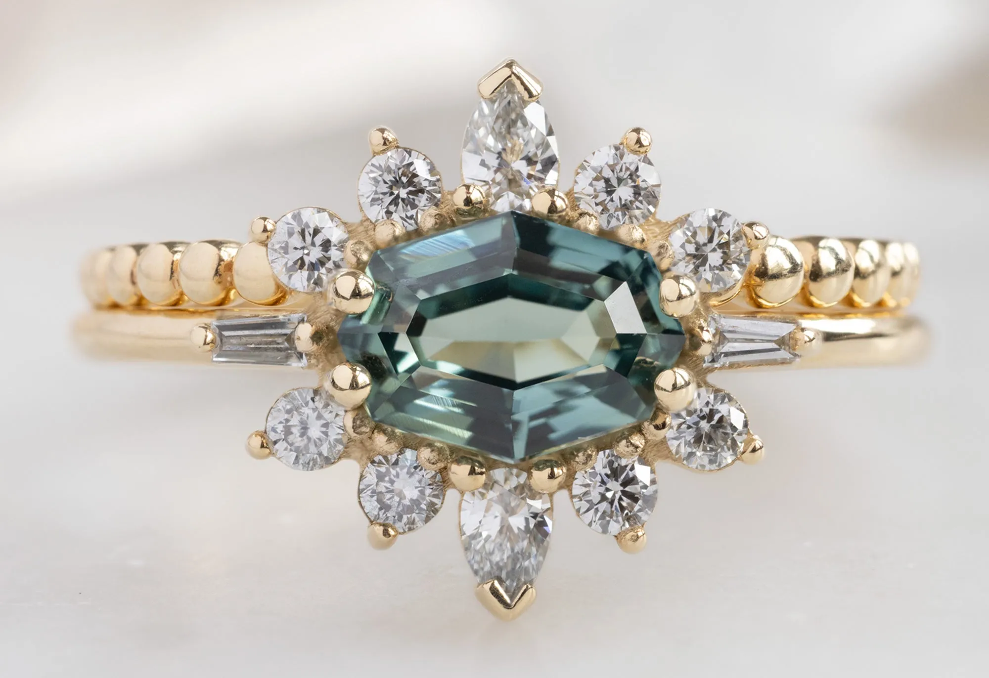 The Lotus Ring with a Geometric Sapphire